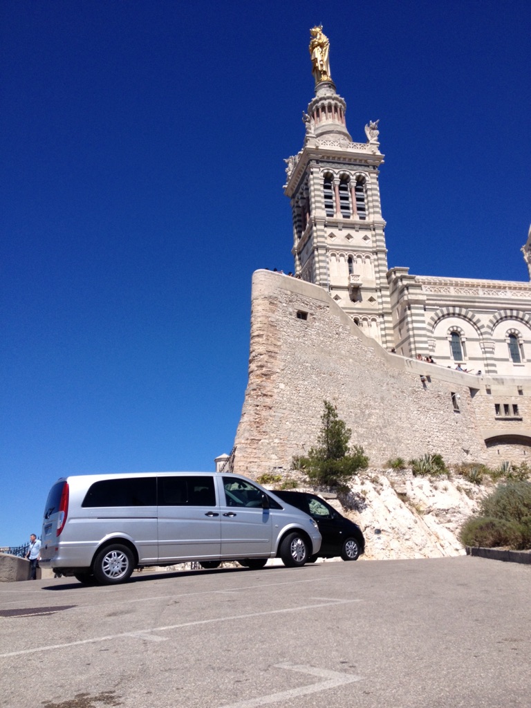 Vans in front of Notre Dame de la Garde in Marseille